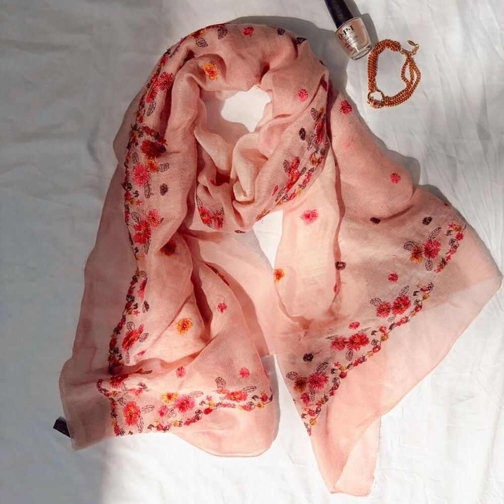 Light pink silk scarf featuring dainty floral embroidery